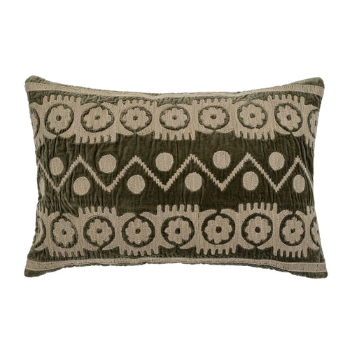 Olive green decorative pillow with embroidered geometric pattern on a white background