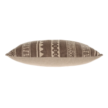 Decorative pillow with brown and beige pattern on a white background