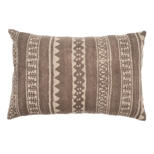 Decorative pillow with brown and beige pattern on a white background