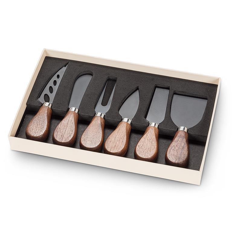 Six wooden handled cheese knives in a box 