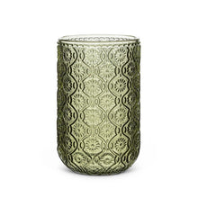 Olive green highball glass with embossed daisy pattern on white background