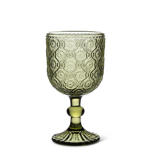 Olive green ine goblet with embossed daisy design on white background