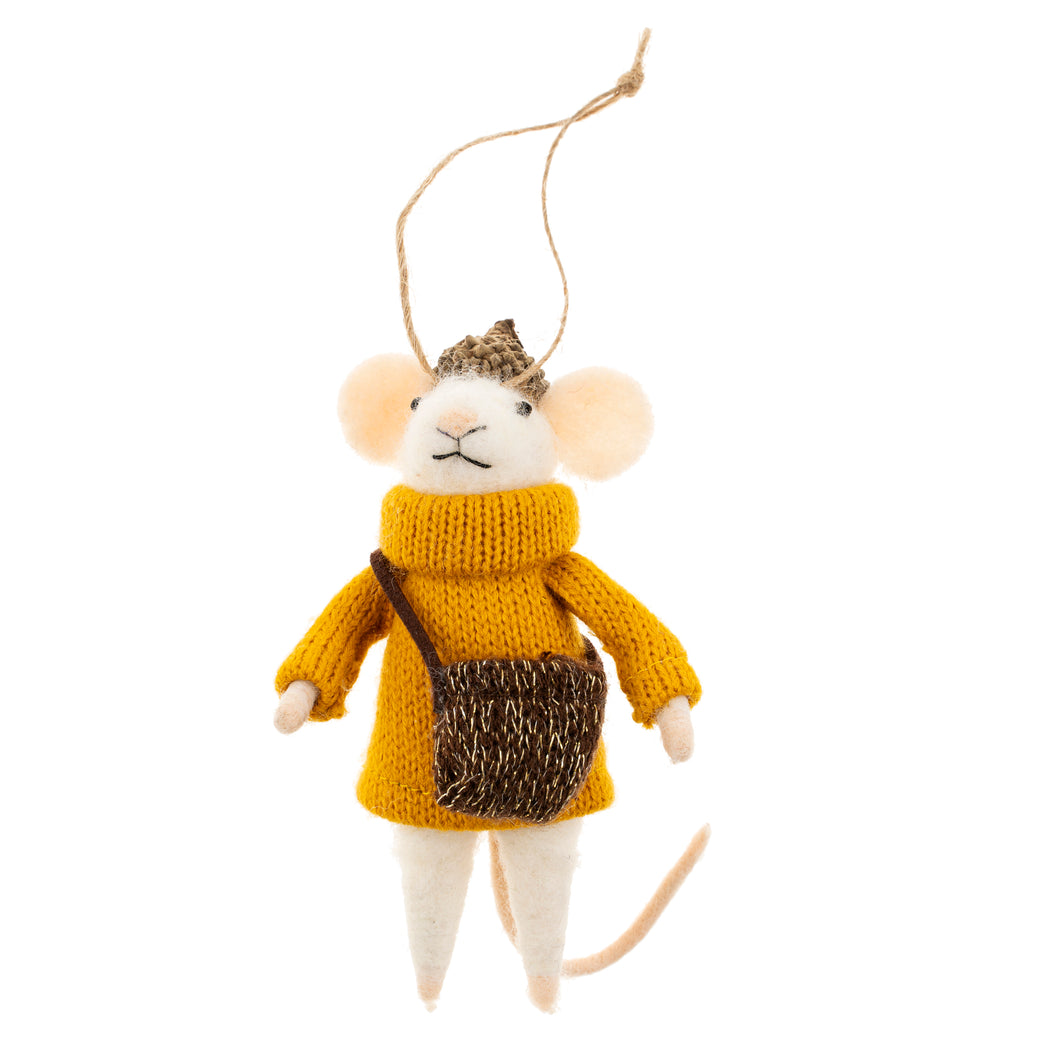 Knitted mouse ornament wearing a yellow sweater and carrying a brown bag on a white background
