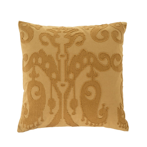 Ochre colored cushion with ikat embroidery print on white background