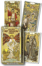 Golden Art Nouveau Tarot cards with decorative covers featuring figures and text.