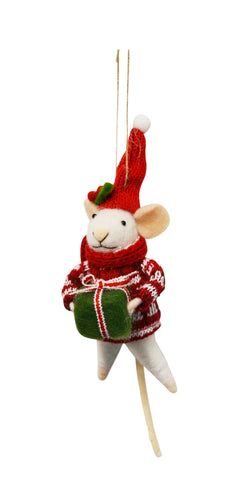 Decorative mouse ornament wearing a red sweater and green hat, holding a gift, on a white background.