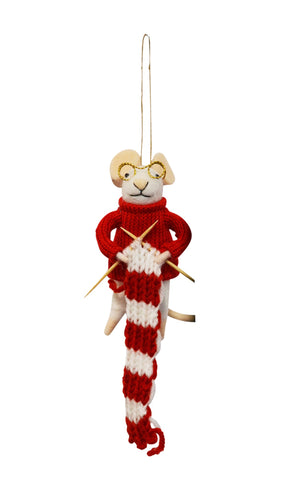 Knitted mouse ornament with red and white scarf on a white background