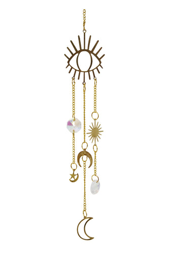 Decorative hanging with celestial symbols and evil eye on a white background