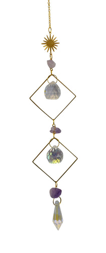 Decorative hanging chain with gemstone pendants on a white background