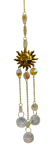 Decorative hanging ornament with sun design and beads on a white background