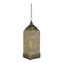 A vintage-style hanging lantern with a dark metal chain, top cap, and base, featuring frosted glass panels decorated with gold floral and religious motifs.