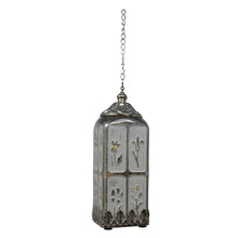 A vintage-style hanging lantern light fixture with a silver-toned metal frame, chain, and decorative panels featuring embossed floral and botanical motifs.