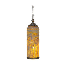 A hanging pendant light with a cylindrical glass shade featuring intricate cutout patterns and warm yellow-gold illumination, suspended by a dark metal chain against a plain white background.