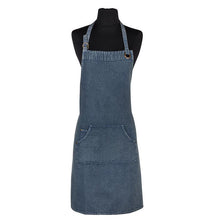Denim blue apron on mannequin with patch pocket on front
