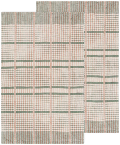 Two plaid tea towels with green and beige pattern on a white background