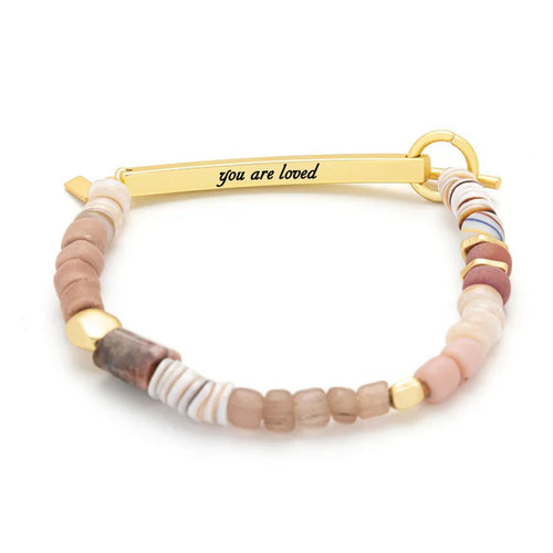 Bracelet with multicolored beads and gold clasp with text you are loved on a white background