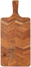 Acacia wooden cutting board with a chevron pattern on a white background