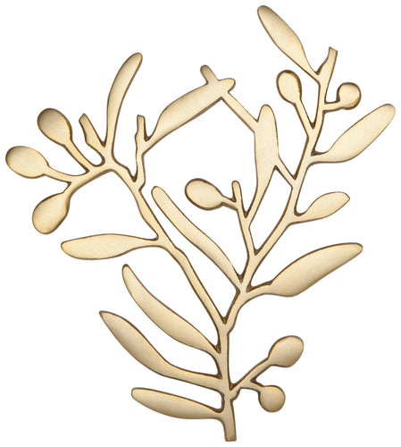 Gold leaf trivet on a white background