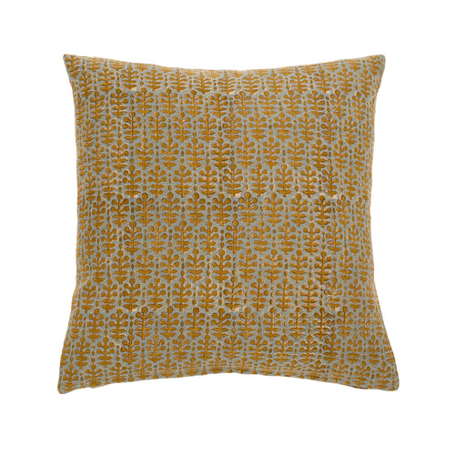 Muted blue and ochre throw pillow with decorative floral pattern