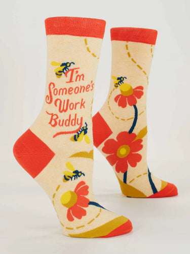 Colorful socks with floral designs and text on a white background