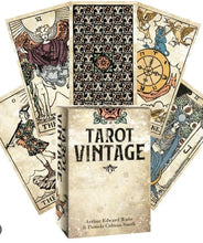 Collection of tarot cards with a vintage design and 'Tarot Vintage' box.
