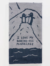 Towel with penguins on a mountain and text 'I love my boring-ass marriage' on a gray background