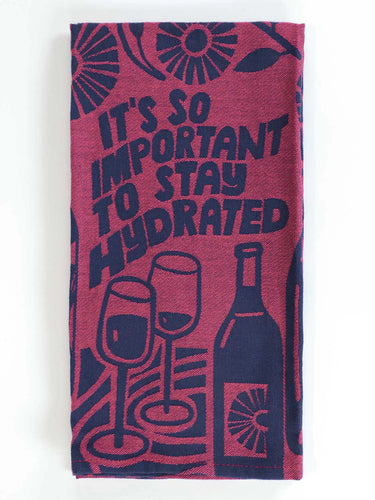 Tea towel with wine graphics and text 'It's so important to stay hydrated' on a white background