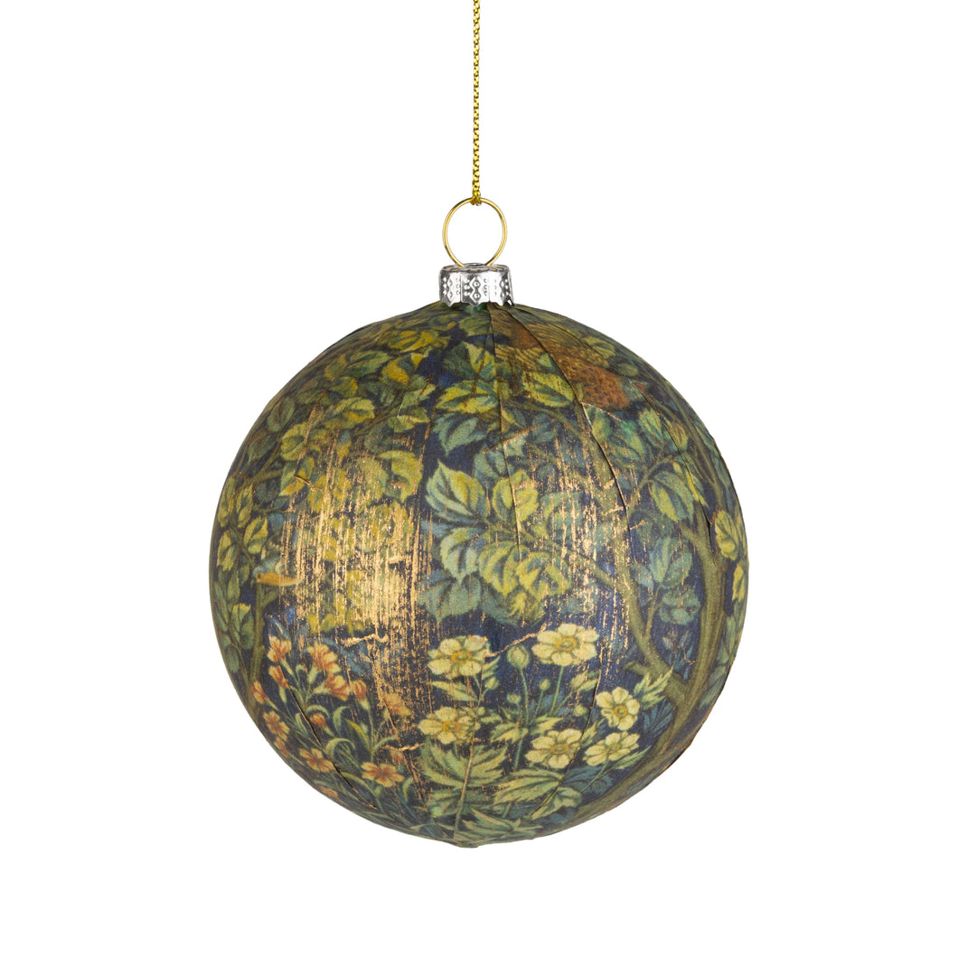 A spherical Christmas ornament featuring a vintage botanical pattern with green leaves and yellow flowers on a dark background, suspended by a gold chain with a gold ring and silver cap.