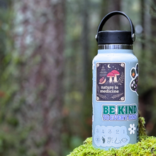 Water bottle with stickers on it