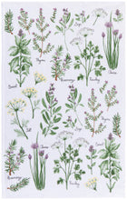 Tea towel with illustration of various herbs and plants.