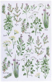 Tea towel with illustration of various herbs and plants.