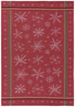 Red tea towel with white snowflake pattern and green stripes
