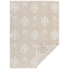 Beige rug with bird and floral pattern on a white background