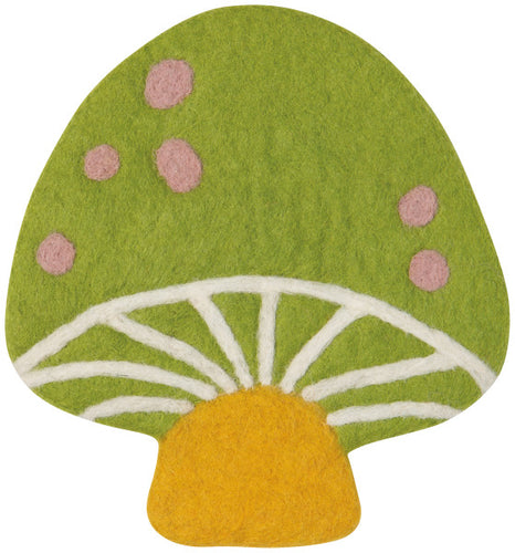 Mushroom-shaped wool trivet with green cap, pink spots, and yellow stem on a white background