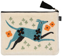 Pouch with a blue dog design and flowers on a beige background