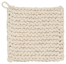 Knitted pot holder with a white background